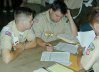 [A Lodge Chief and his adviser register their contingent at NOAC]