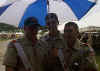Three Timmeu Lodge Members in the Rain
