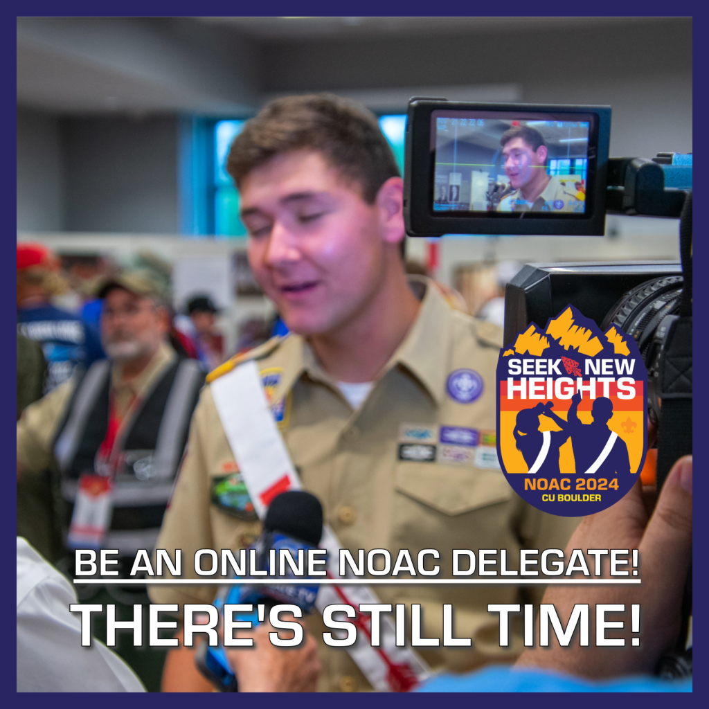 A young man in a tan uniform is speaking to an older man, while being filmed by a video camera. Text on the image reads: "Be an online NOAC delegate! There's still time!" and an emblem with "Seek New Heights, NOAC 2024" is visible.