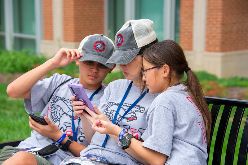 Scouts using a cell phone